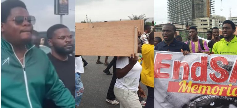 Nigerians carry dummy coffin as they stage EndSARS memorial walk along the Lekki tollgate