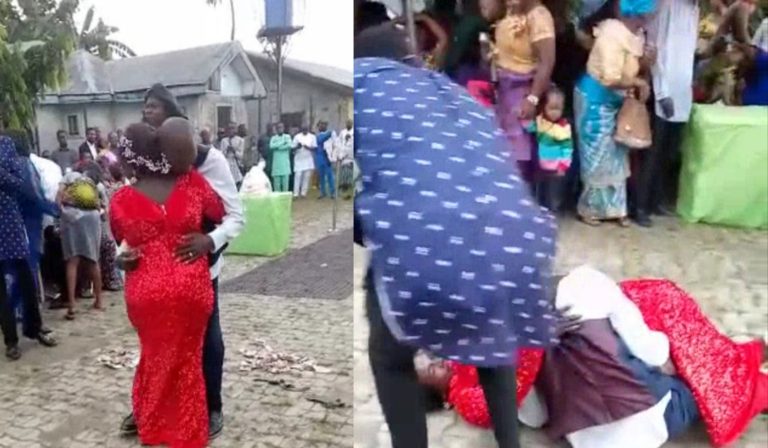 Romantic groom falls while trying to lift bride up at their wedding reception