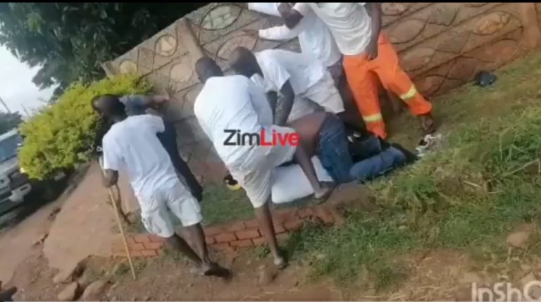 Church members beat men who pointed gun at their Pastor during a door-to-door ministration (video)