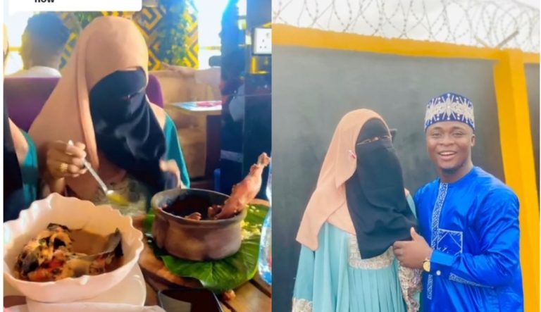 Islamic cleric shows how his niqabi wife eats in public without removing her face covering
