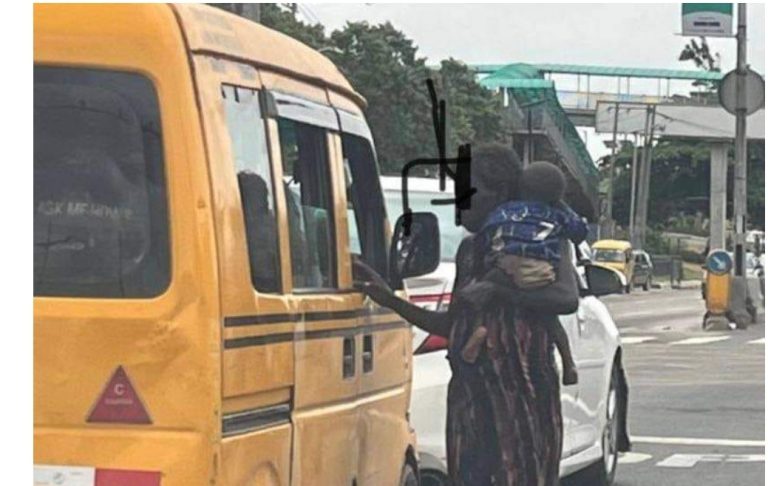 “You have a baby you can’t cater for and you are pregnant with another?” – Nigerian man asks as he shares photo of a woman begging with her child