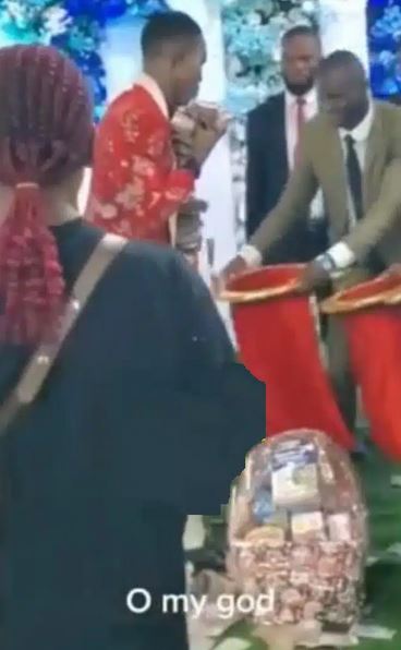 The moment big boys showered their pastor with stash of money at the altar (Video)