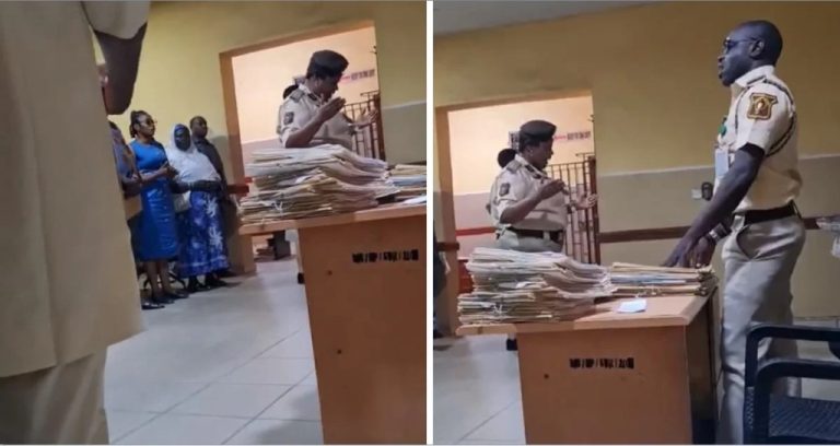 Man bemused as Immigration officers mandate workers and passport applicants to engage in long prayer session (Watch video)