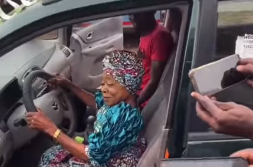 Days after publicly begging for a car, veteran actress, Iya Gbonkan, gets a car gift from one of her fans (video)