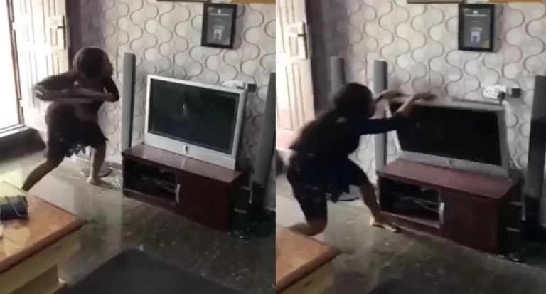 Nigerian lady destroys boyfriend’s TV for allegedly sleeping with her friend (Watch video)