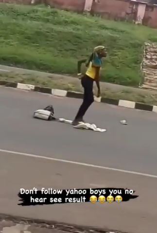Lady runs mad after being dropped by yahoo boy in the middle of a road (Video)