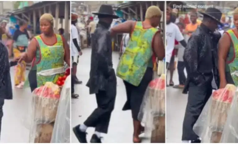 Man stirs reaction as he dances like Michael Jackson beside lady in market, she pushes him away (Video)
