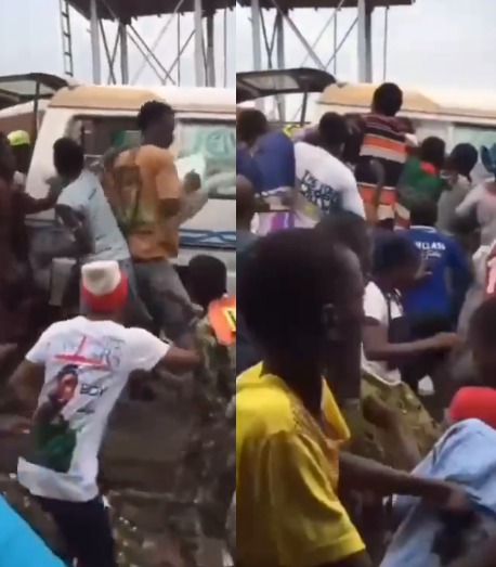 Residents cart away bags of rice from broken down vehicle (video)