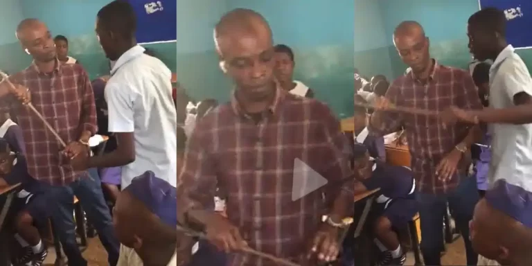 “E go repeat that class” – Student generates buzz online as he challenges male teacher, wrestles cane with him
