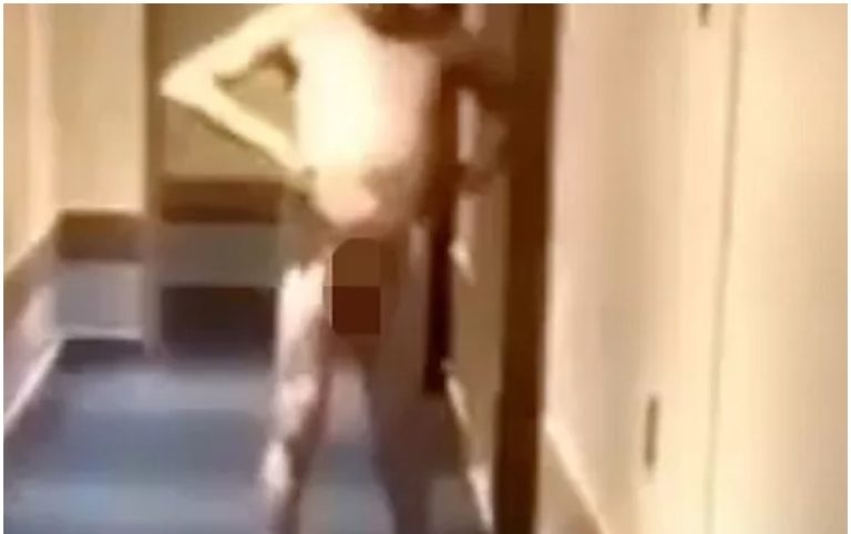 Naked man tackled and sprayed with fire extinguisher after he was locked out of his hotel room (video)