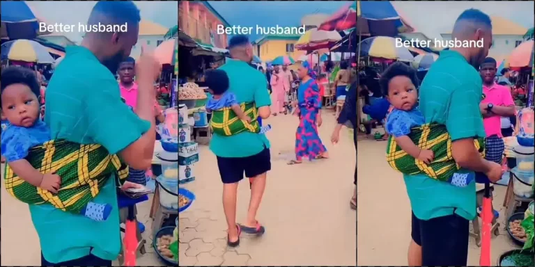 Nigerian man praised as he storms market backing baby (Video)
