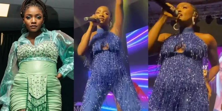 “Someone is pregnant, dance small, small” – Pregnancy speculations circulate as Simi performs on stage in jumpsuit (Video)