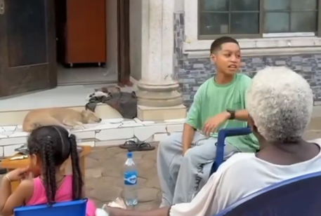 “No matter where this oyibo boy travel go, him must reach village” – Mixed-race boy raised abroad seen speaking fluent Igbo with his grandmother (Video)