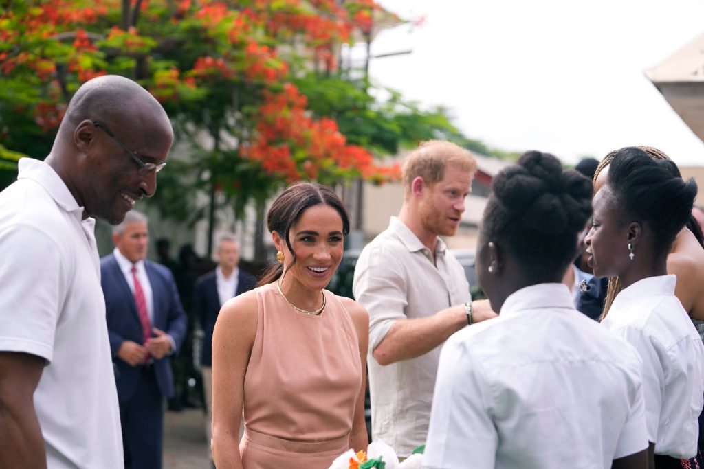 Prince Harry and Meghan Markle visit Abuja school as they arrive ...