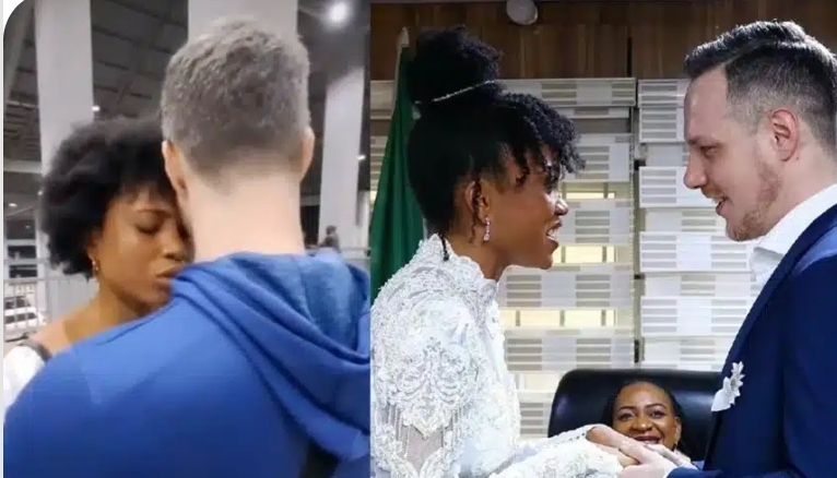 Lady cries a river as she escorts her Caucasian husband to the airport