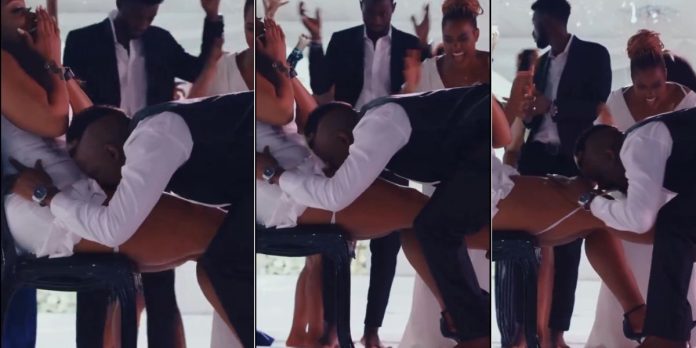 “This is too wild” – Moment man uses teeth to remove his wife’s pant on their wedding (Video)