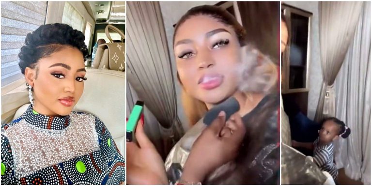 Video footage of billionaire wife, Regina Daniels smoking in front of a kid provokes backlash