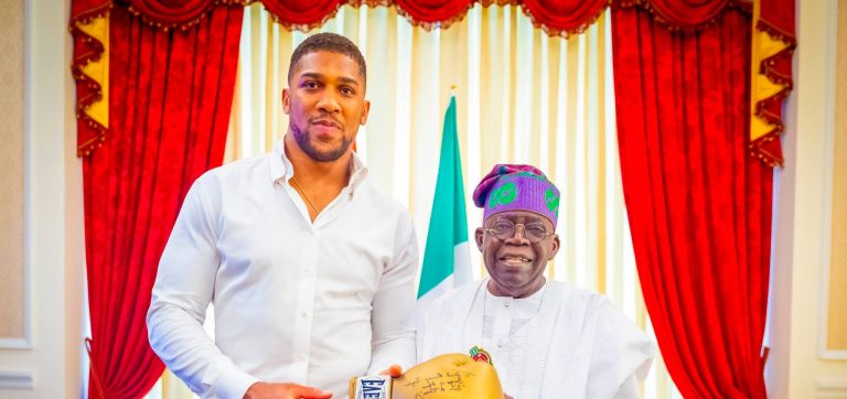 Boxer, Anthony Joshua, visits President Tinubu in Lagos state, presents him with his autographed glove