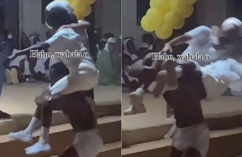 “He don break their spinal cords” – Reactions as hefty corper attempts to lift two ladies at a time during ‘Mr Macho’ competition in NYSC camp (Video)